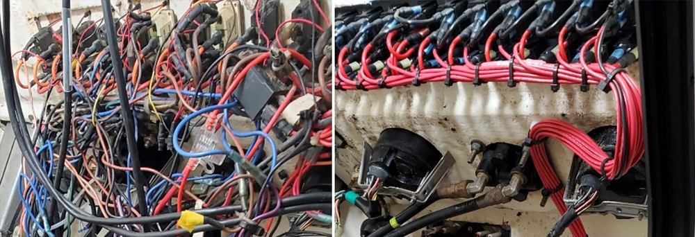 Marine wiring harness with relays, terminals and color-coded cabling inside a boat, with no business name or town visible.