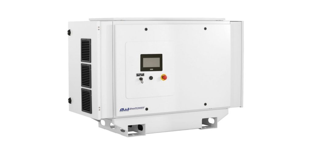 White ATLAS ShorePOWER shore power unit with a touchscreen panel, key switch, and red emergency stop, shown against a plain background.