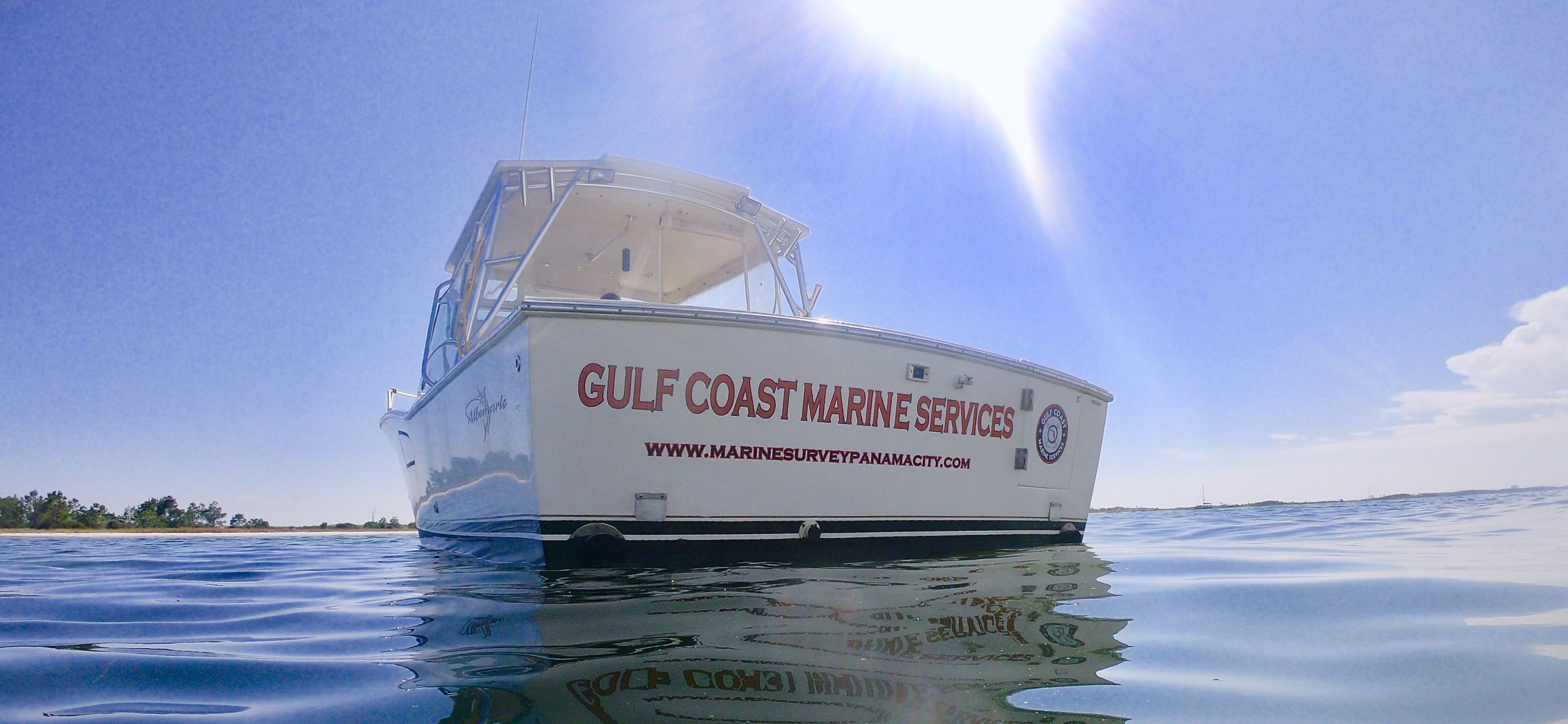 Gulf Coast Marine Services survey boat on calm water at Panama City, Florida.