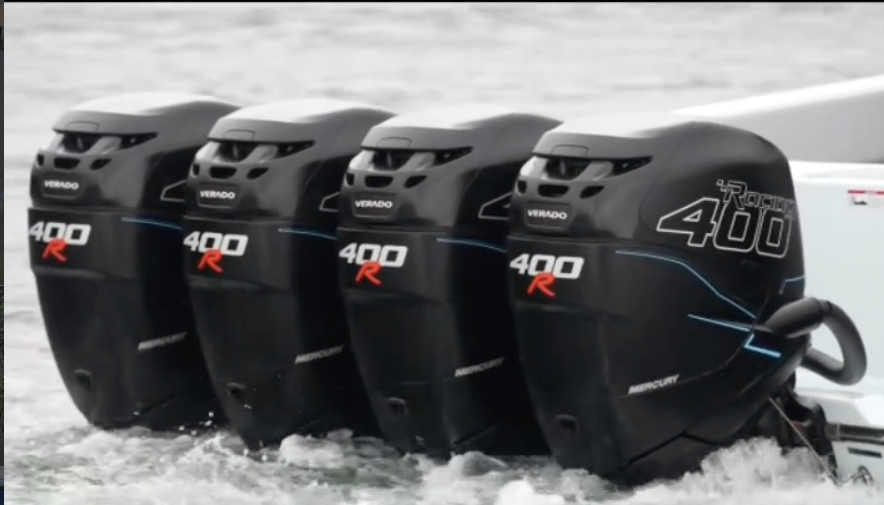 Four Mercury Verado 400R outboard engines mounted on the stern of a boat cruising through choppy water.