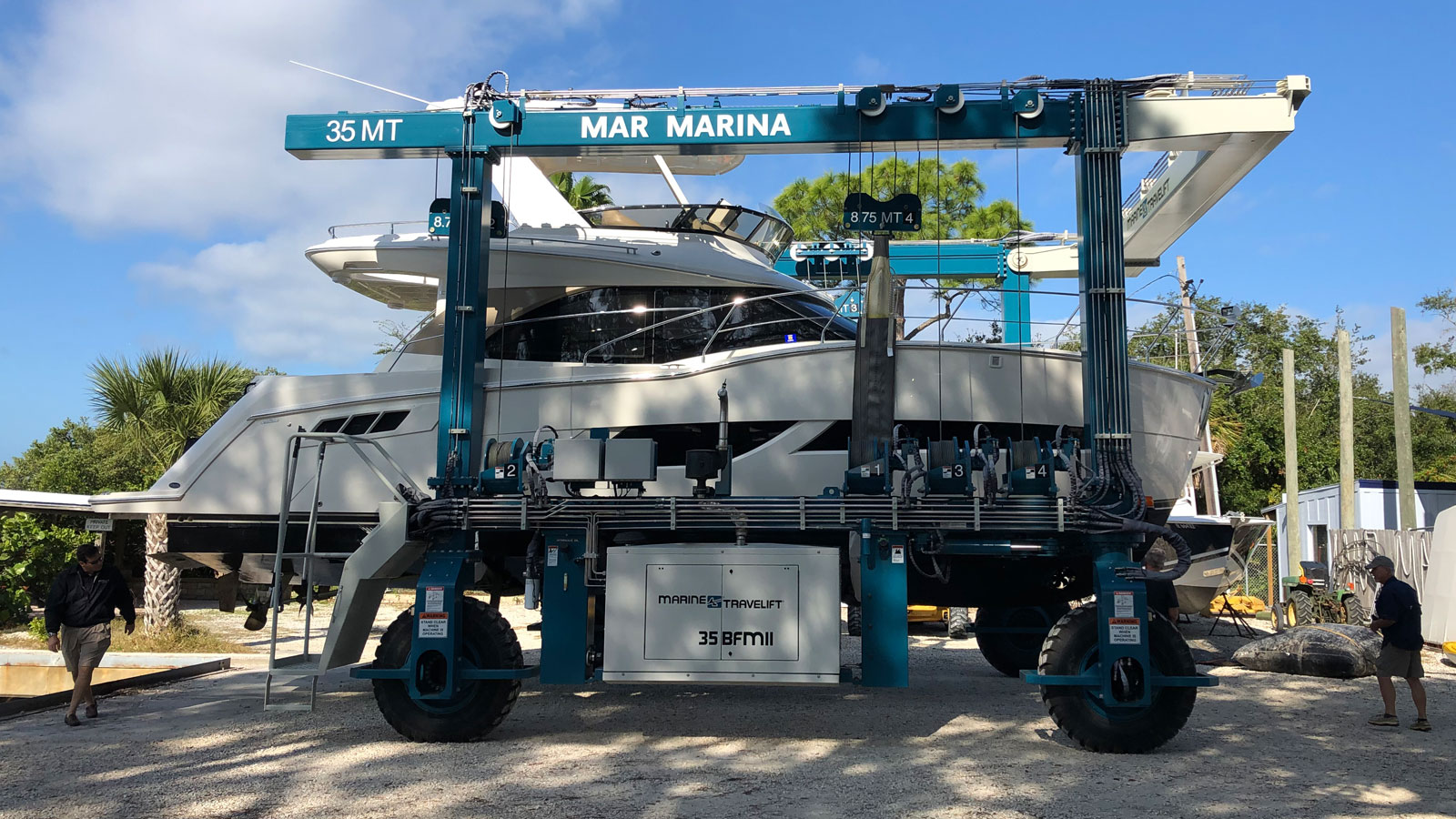 Motor yacht raised on a 35 MT Marine Travelift boat lift at Mar Marina.